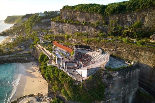 The amphitheater of the local show Kecak Dance at Melasti Beach over a cliff near the ocean on the island of Bali