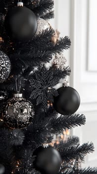 Elegant black and silver Christmas tree decorations.
