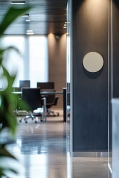 A glossy, circular sticker with a professional company logo adheres to a polished steel surface in a sleek, modern office. features a clean industrial setting with natural light, stylish furnishings, and an open layout reflecting contemporary corporate aesthetics.