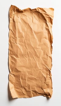 A single piece of torn brown kraft paper is centrally placed on a pristine white background, offering a simple yet effective design ideal for eco-friendly branding, product visuals, or minimalist themed projects.