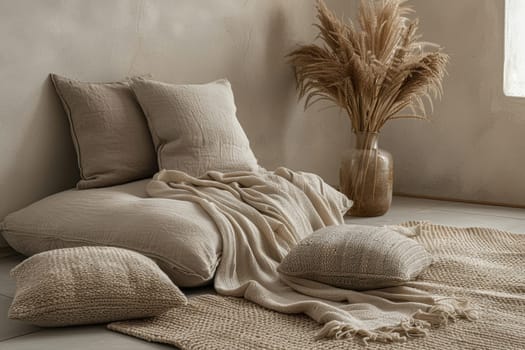 A cozy living room featuring mocha mousse accents, showcasing textured cushions, a soft throw blanket, and a stylish vase filled with pampas grass. perfect for adding warmth and elegance to interior design projects.