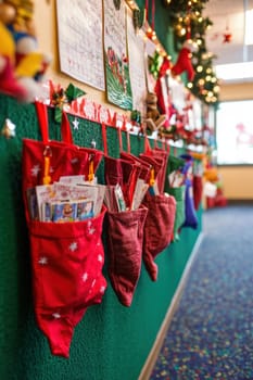 Community center bulletin board adorned with a creative advent calendar featuring large pockets filled with charity ideas and donation suggestions. the holiday atmosphere is enhanced by sparkling decorations and a nearby christmas tree.