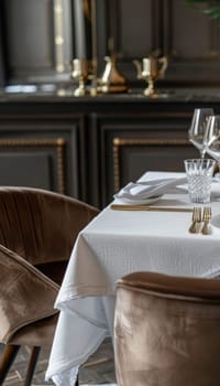 Luxurious dining scene featuring mocha mousse upholstered chairs and a white linen tablecloth. elegant touches include ornate gold cutlery and a refined floral centerpiece, set against a rich, classic backdrop perfect for sophisticated events.