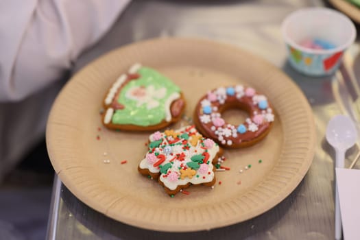 Three beautifully decorated gingerbread cookies delightfully made, perfect for any festive celebrations or gatherings