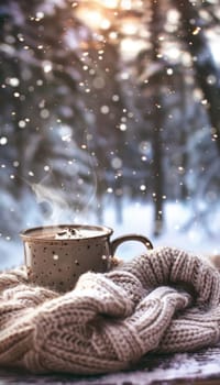 A tranquil winter setting featuring a pair of knitted gloves holding a steaming cup of hot chocolate, accompanied by a knit scarf. snowflakes gently fall around, creating a cozy and festive atmosphere, perfect for the chilly season.