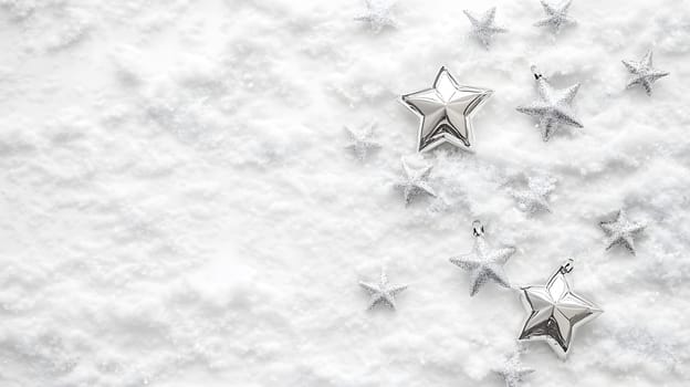 Silver stars scattered on a snowy background for festive decoration.