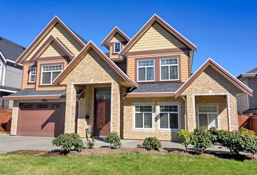 A perfect neighbourhood. Brand new luxury family house on bright spring day in Surrey, BC, Canada.