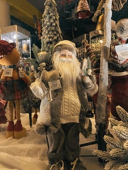 Aesthetic Warm Vintage Shop Window Photo with Santa Claus for Christmas. High quality photo