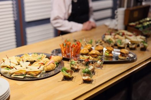 A beautifully arranged buffet offers a variety of delicious appetizers and refreshing drinks for guests