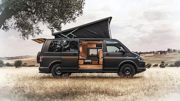 Sleek black camper van is parked in a field, its door open to reveal a cozy interior, inviting you to experience the freedom of the open road