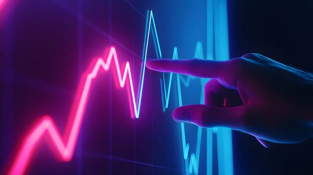 A hand points at a colorful data graph on a digital screen.