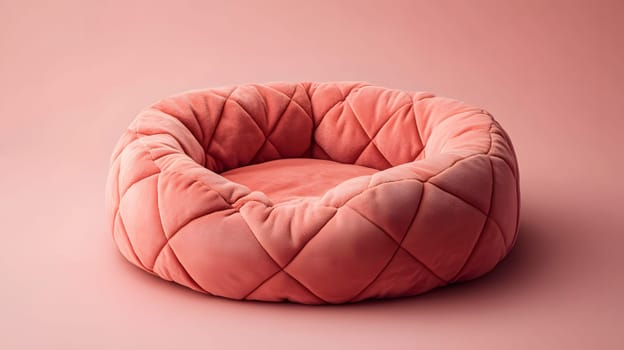 A plush, round pet bed in a soft coral color, designed for comfort.