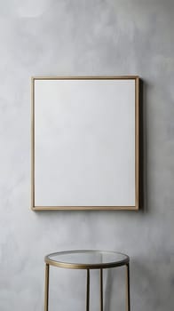 A blank framed canvas on a minimalist wall with a glass table.