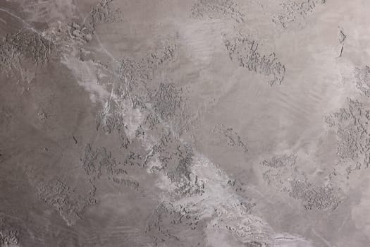 A sleek and stylish abstract texture presented in soothing and calming gray tones that feature intricate patterns