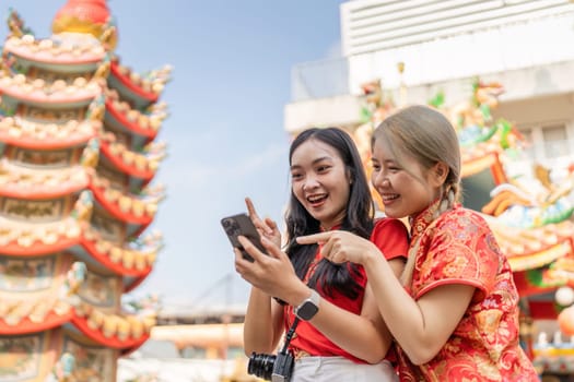 Tourists immerse themselves in the lively celebrations of Chinese New Year capturing joyful moments.