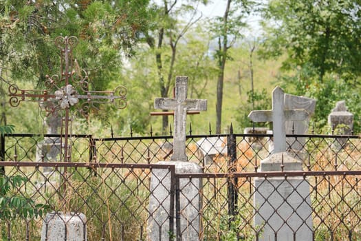 Abandoned graves in a cemetery Russia