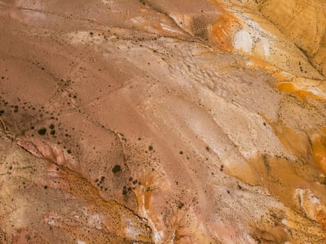 Aerial drone view of colorful eroded landform of Altai mountains in popular tourist location called Mars, Chagan-Uzun, Altai Republic, Russia