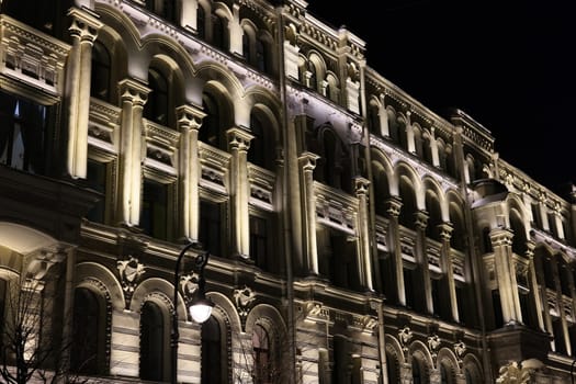 There is a stunning and captivating view of a beautifully lit historical building at night that mesmerizes all