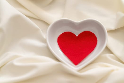 Red heart on a white background. Valentine's day concept, love, family