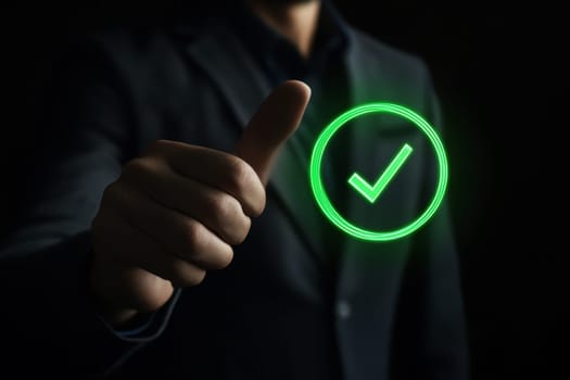 Businessman displaying a green check mark hologram, emphasizing compliance and certification concepts in a modern business environment.