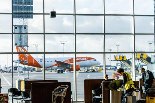 Easy Jet plane parked at Copenhagen airport. Travel by plane. Copenhagen, Denmark - November 27, 2024