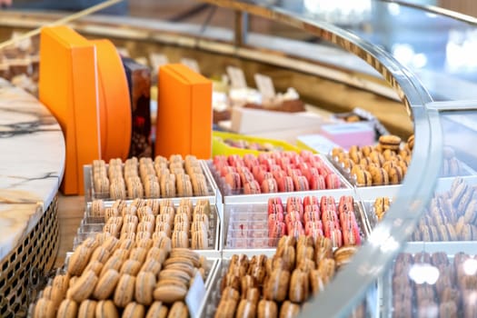 Various assortment of desserts confectionery on the counter in a bakery. Paris, France