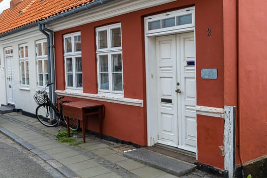 Traditional old residential houses with tiled roofs on the island of Bornholm, Denmark - November 20, 2024