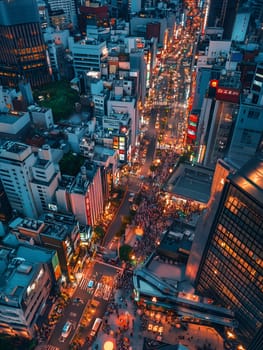 A vibrant aerial view of a city at night, showcasing illuminated streets, skyscrapers, and crowded sidewalks. Neon lights and urban activity create an energetic atmosphere.