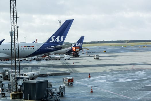 SAS plane parked at Copenhagen airport. Travel by plane. Copenhagen, Denmark - December12, 2024