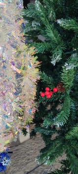 new year tree, christmas holiday red flower, gold ball decor. High quality photo
