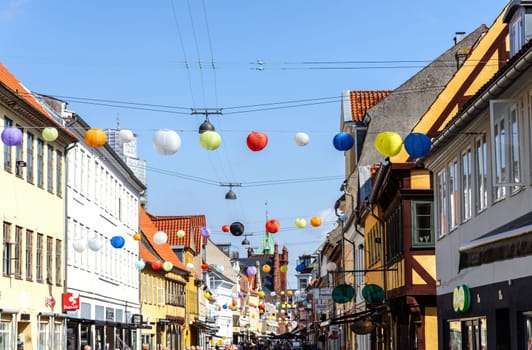 Colorful houses on the old street of the city of Elsinore, Denmark - September 17, 2024