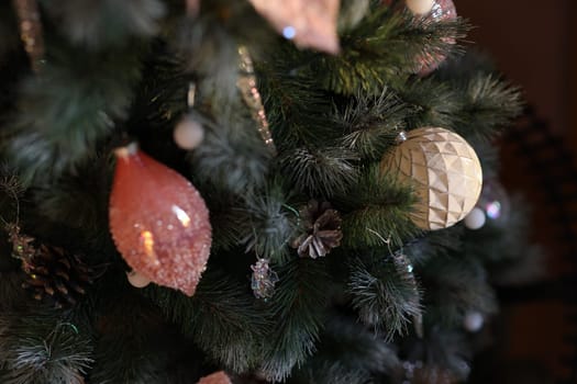 A beautifully adorned Christmas tree that features stunning ornaments along with exquisite festive details