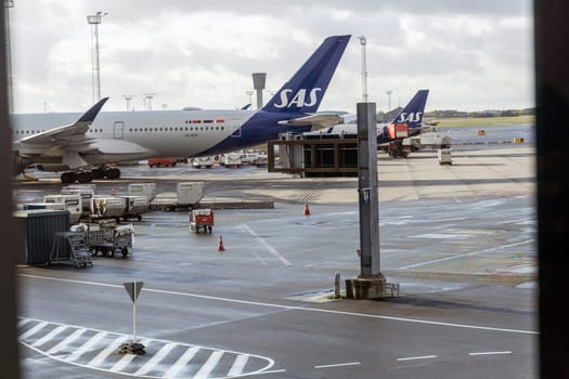 SAS plane parked at Copenhagen airport. Travel by plane. Copenhagen, Denmark - December12, 2024