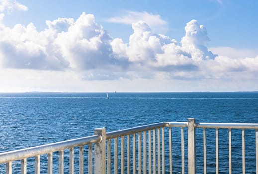 Sailbot at sea on a sunny day. Beautiful seascape.