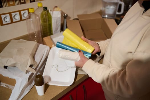 Recycling activities at home, showing materials like paper, plastic, and biodegradable items prepared for proper disposal in a sustainable manner.
