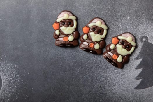 Christmas chocolates. Chocolate Santa Claus. High quality photo