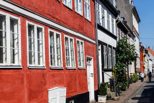 Colorful houses on the old street of the city of Elsinore, Denmark - September 17, 2024