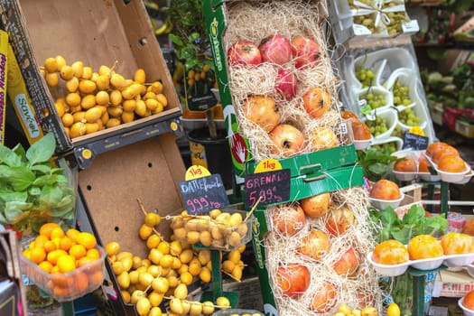 Shop with various fruits outside. French fruit market. Paris, France - November 11, 2024
