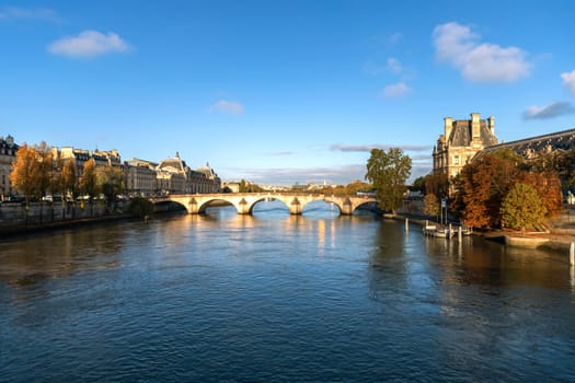 Beautiful cityscape with view of the Seine River and bridge. Paris, France - November 5, 2024