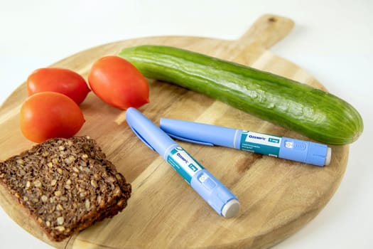 Ozempic Insulin injection pen or insulin cartridge pen for diabetics. Medical equipment for diabetes parients. Denmark- Oktober 10, 2023