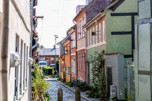 Colorful houses on the old street of the city of Elsinore, Denmark - September 17, 2024