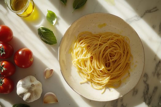 Overhead view of a modern kitchen countertop arranged with fresh ingredients including tomatoes, garlic, basil, and olive oil, surrounding a plate of spaghetti with red tomato sauce and grated cheese on a marble surface.