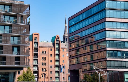 Facades of modern buildings in the city of Hamburg Germany. Residential area in the city. Modern architecture. Multi-story houses. Office building. Rent an apartment. Tourism in German.