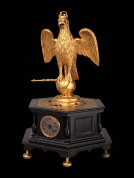 A close-up of an antique German automaton clock in the form of an eagle, crafted in Augsburg around 1630, with intricate details and a mechanical movement