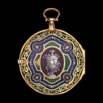 Antique gold watch case with enamel and diamond accents.