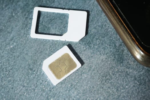 A sim card for a smart phone on table .