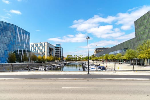 Modern glass office building in an expensive area of Copenhagen, Denmark - August 30, 2023.