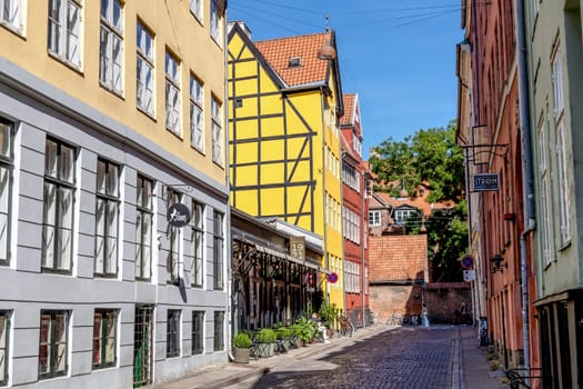Old houses in the city center. Real estate investment. Expensive housing. Copenhagen, Denmark - September 15, 2023.
