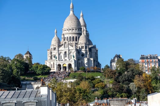 View from above of Paris and the hill of Montmartre and the Sacre Coeur Cathedral. Paris, France - November 15, 2024