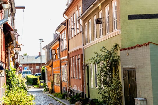Colorful houses on the old street of the city of Elsinore, Denmark - September 17, 2024